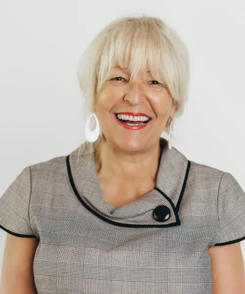 a woman smiling for the camera