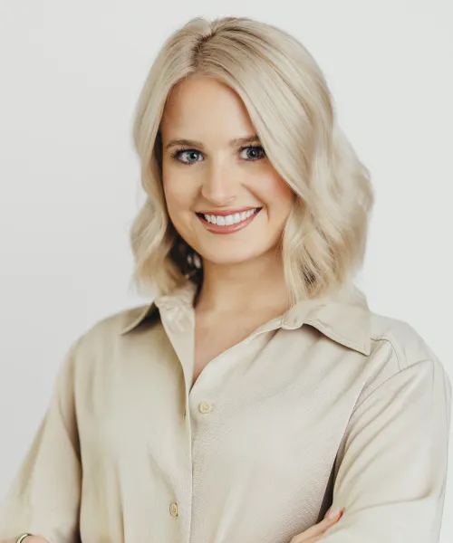 a woman smiling for the camera