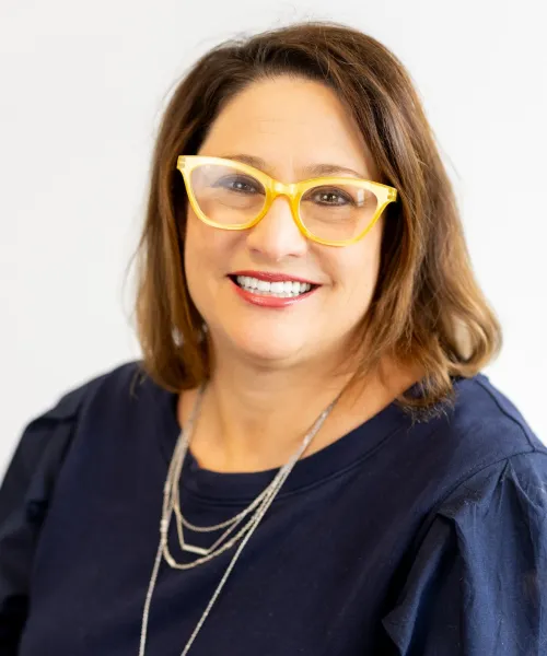 a woman wearing glasses