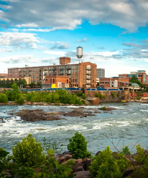 a body of water with buildings along it