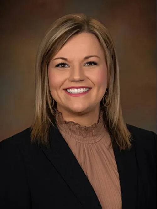 a woman smiling for the camera