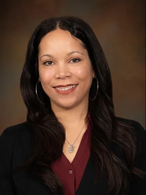 a woman smiling for the camera