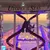 Sunset view of Utopia of the Seas cruise ship with large twin water slides and observation tower
