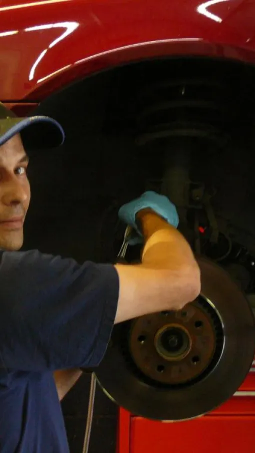 a man working on a car