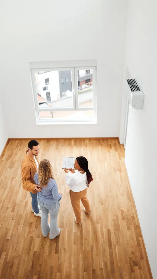 a group of people looking at a window