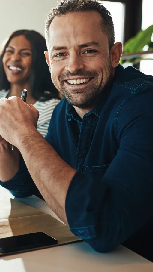 a person smiling at the camera