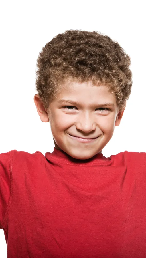 boy in red shirt making strong arms