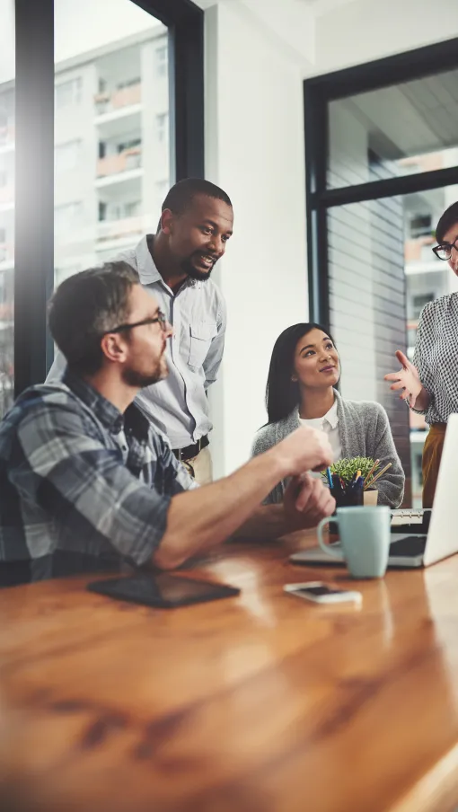 Michalla Petersen et al. sitting around a table