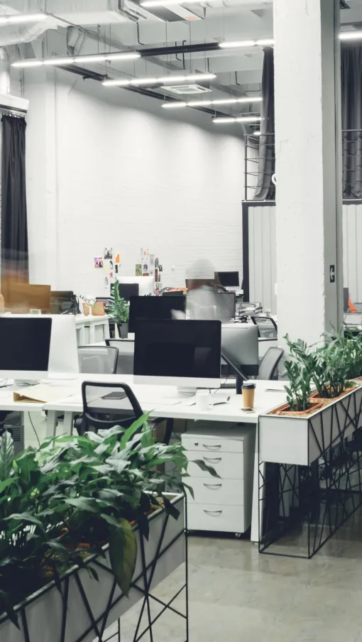 a group of people walking in a building