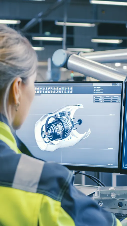 a woman looking at a screen