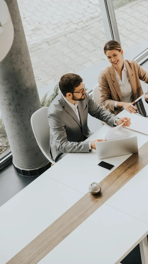 a group of people sitting around a table