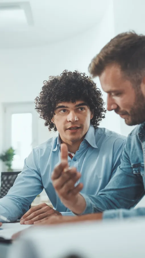 a few people sitting at a table