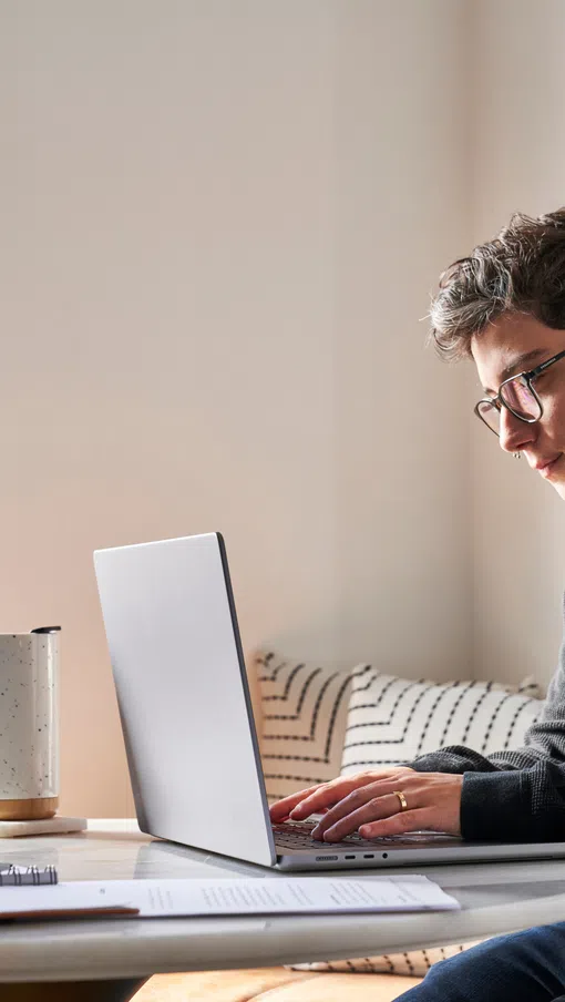 a man using a laptop