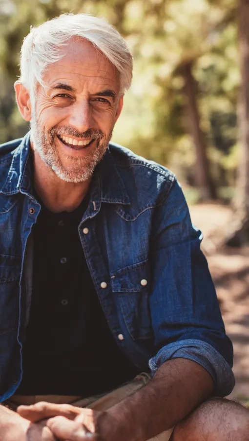 a man sitting on a log