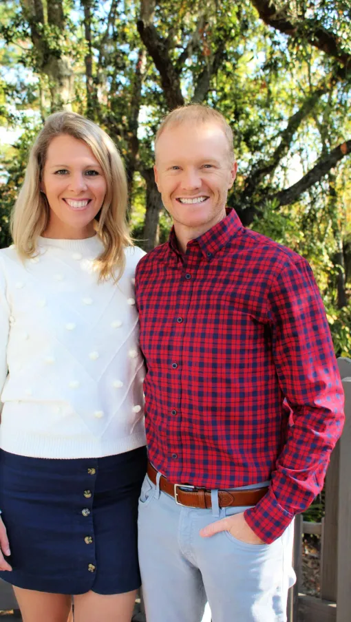 a man and woman posing for a picture