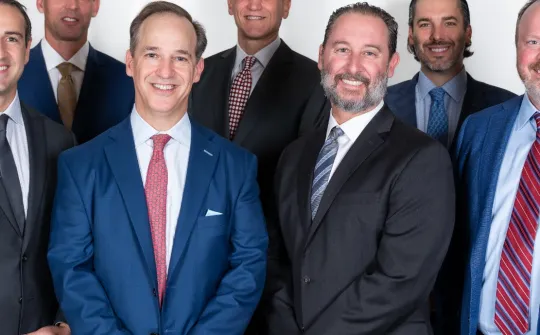 a group of men in suits