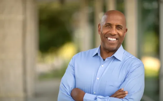 a man with his arms crossed