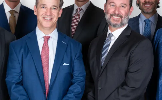 a group of men in suits