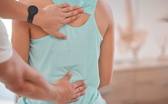 a woman holding her belly