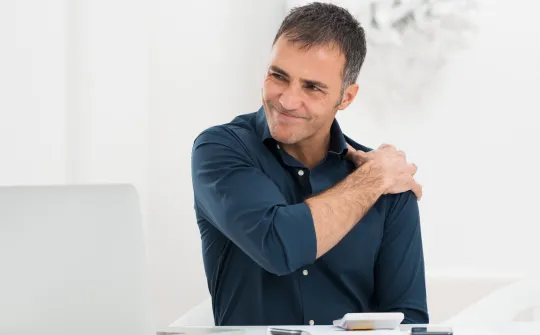 a man sitting at a desk