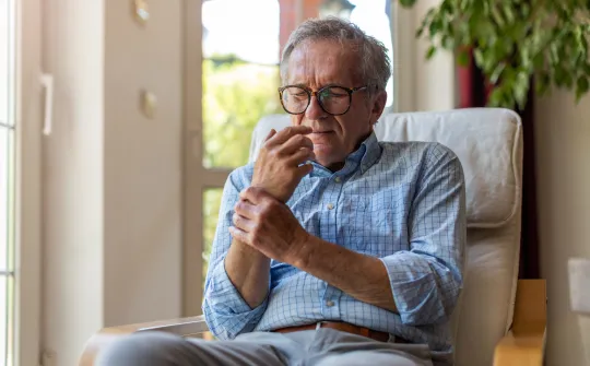 a man sitting in a chair