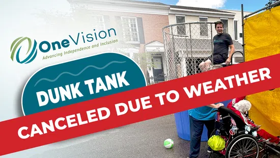 OneVision Dunk Tank event canceled due to weather with a person in a wheelchair near the dunk tank setup.