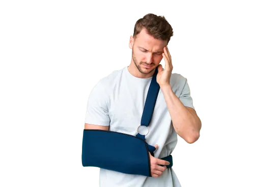 Man in white t-shirt wearing a blue arm sling, holding his head in pain, isolated on white background