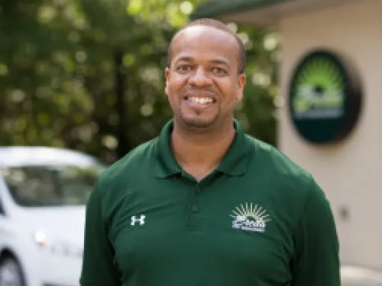 a person in a green shirt