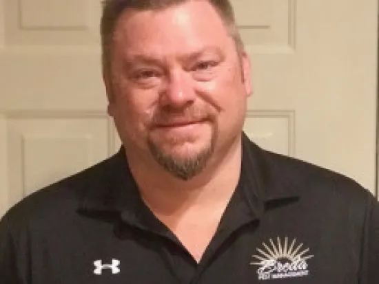 a man smiling for the camera