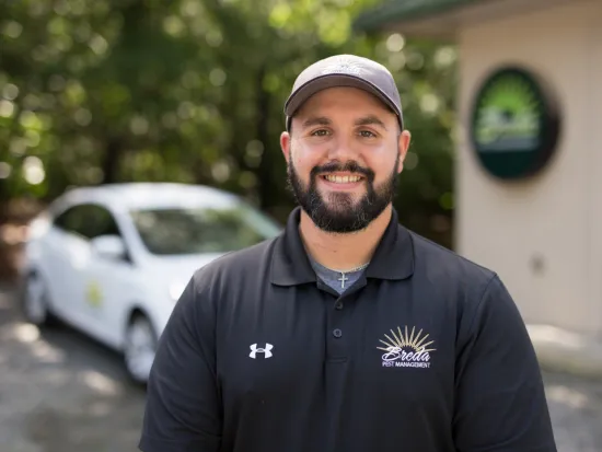 a man standing in front of a building