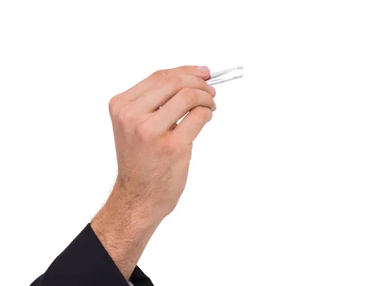 tweezers removing a tick