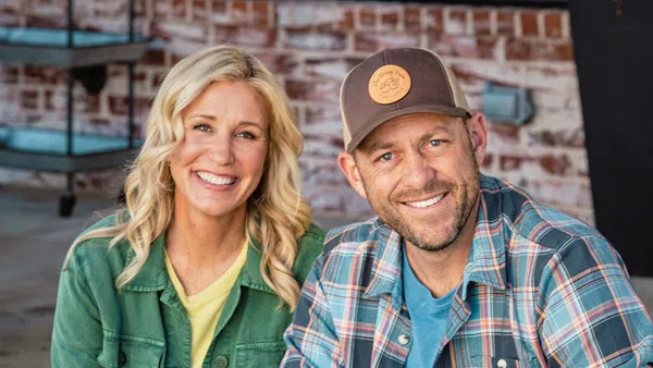 a man and a woman smiling