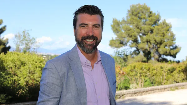 a man smiling for the camera