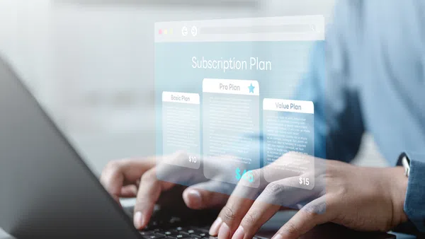A person looking up Meriwether & Tharp subscription payment plan for a divorce on his laptop