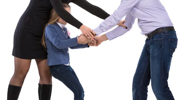a man standing next to a woman