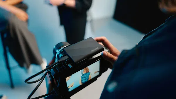a person holding a tablet