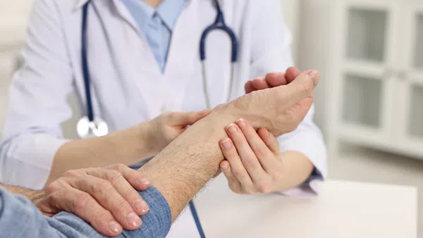 a doctor holding a hand