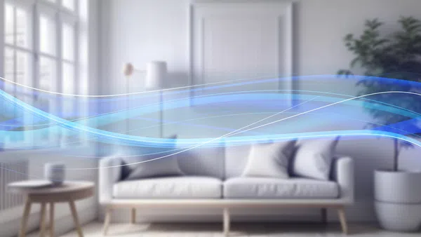 Modern living room with white sofa, wooden side table, indoor plant, and blue digital wave overlay.