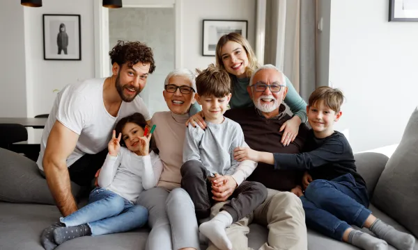 a group of people sitting on a couch