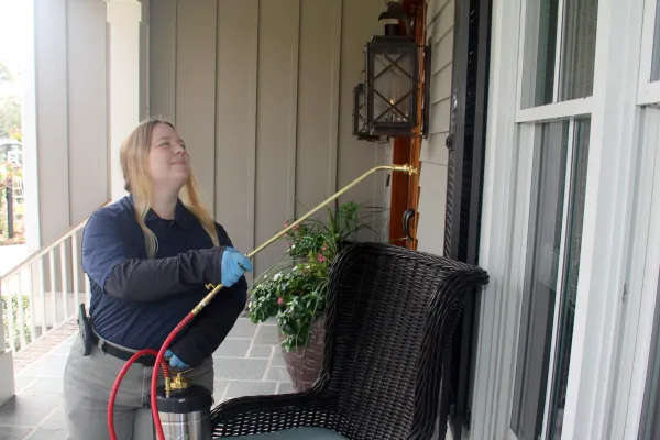 a person holding a hose