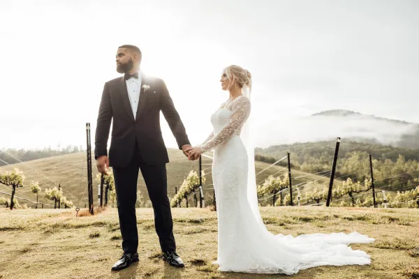 a man and woman in wedding attire