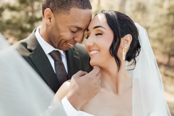 a man and woman in wedding attire