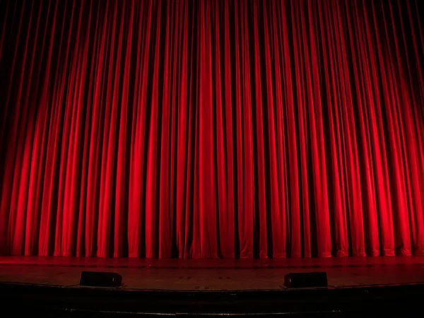 a stage with a curtain