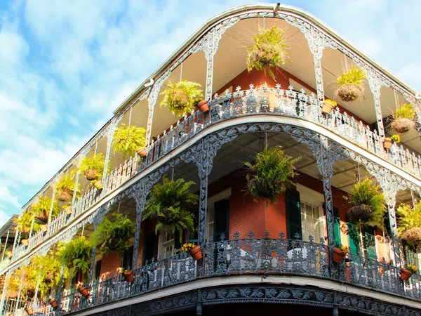 a building with plants growing on the roof