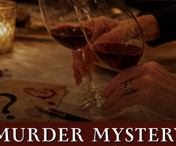 Two hands clinking wine glasses over a table with mysterious notes and dim candlelight ambiance