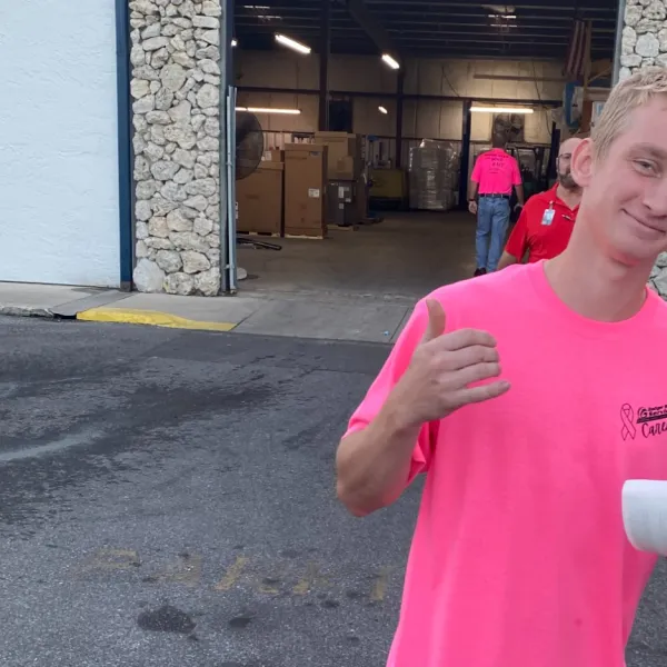 a person holding a bottle