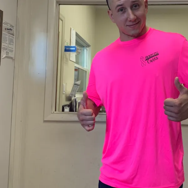 a person in a pink shirt