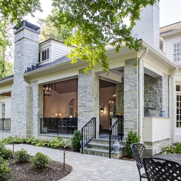 a house with a patio and tables