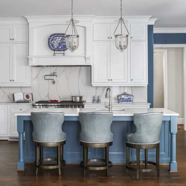 a kitchen with white cabinets