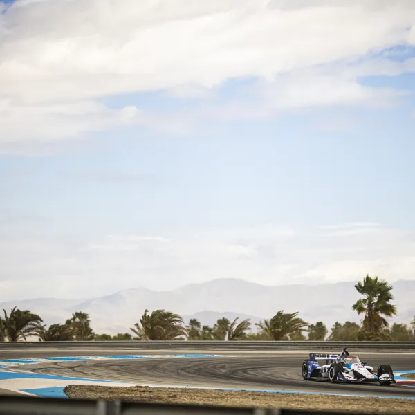 a group of people racing on a track